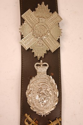 Lot 2193 - A collection of cap badges, glengarry badges...