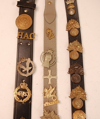 Lot 2196 - A collection of cap badges, collar/shoulder...