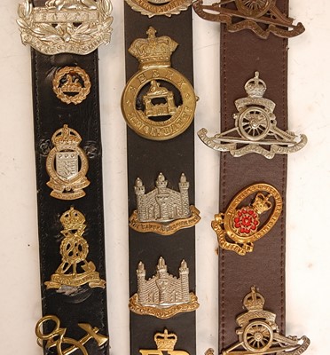 Lot 2200 - A collection of cap badges and insignia to...