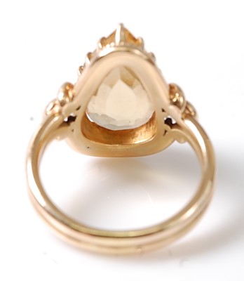 Lot 3130 - A yellow metal citrine dress ring, featuring a...