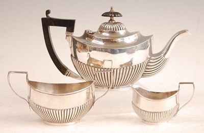 Lot 3072 - A George V bachelors three-piece silver tea...