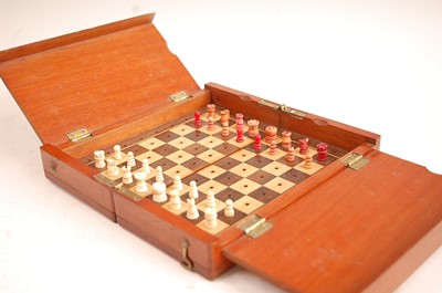 Lot 3188 - A circa 1900 mahogany travelling chess set,...
