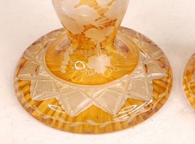 Lot 3043 - A pair of Bohemian cut and amber flash glass...