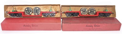 Lot 234 - Two 1937-9 Hornby trolley wagons, plain red...