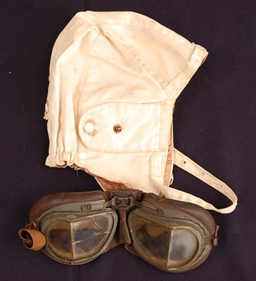 Lot 2446 - A white canvas flying helmet probably Air...