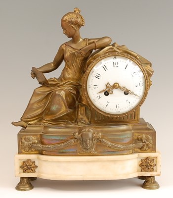 Lot 3324 - A 19th century gilt brass mantel clock, having...
