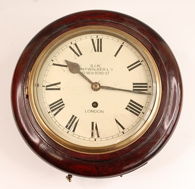 Lot 3325 - An oak cased circular dial wall clock, the...