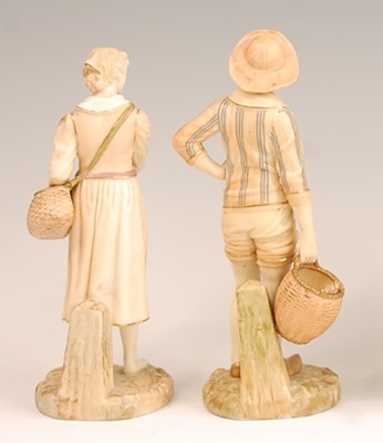 Lot 3034 - A pair of Royal Worcester blush ground figures...