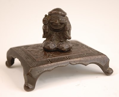 Lot 3236 - A Chinese miniature bronze of a nomadic figure,...
