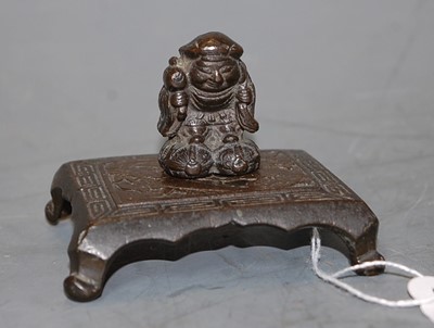 Lot 3236 - A Chinese miniature bronze of a nomadic figure,...
