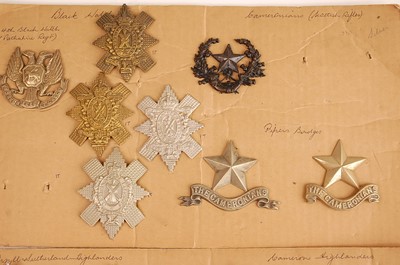 Lot 2209 - A collection of glengarry badges and insignia...