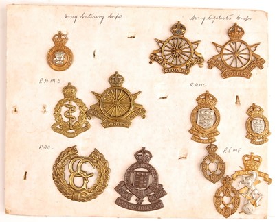 Lot 2211 - A collection of cap and collar badges to...