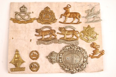 Lot 2212 - A collection of cap badges, glengarry badges...