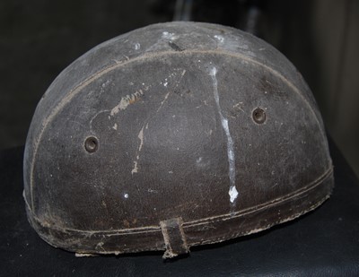 Lot 3442 - A circa 1920s leather motorcycle helmet,...