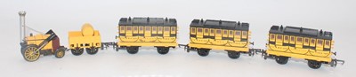 Lot 398 - Triang Rocket with 3 coaches (E-NM)