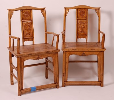 Lot 3241 - A pair of Chinese 'elm' elbow chairs, having...