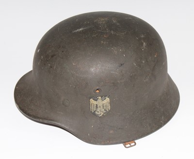 Lot 2461 - A German M42 helmet with army decal, numbered...