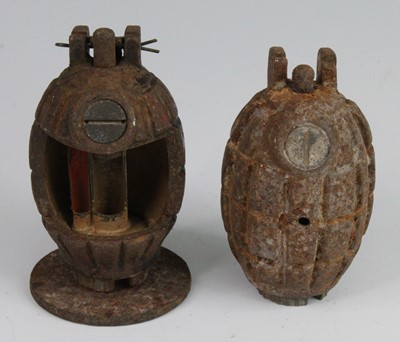 Lot 2462 - A Mills type hande grenade with cut away...