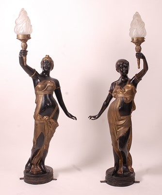 Lot 1209 - A pair of bronzed metal figurines of maidens,...