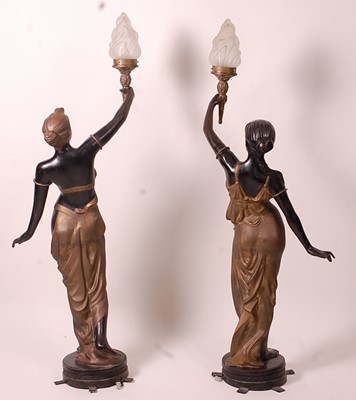 Lot 3219 - A pair of bronzed metal figurines of maidens,...