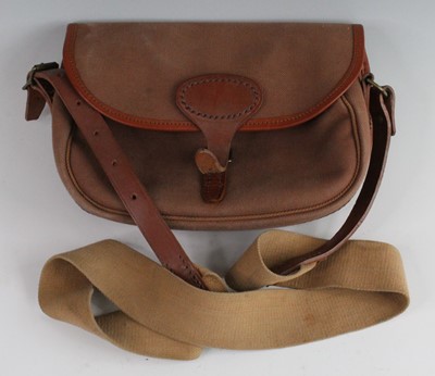 Lot 2563 - A Quality Gunslips canvas cartridge bag with...