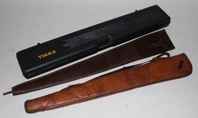 Lot 2564 - A brown leather shotgun slip with brass...