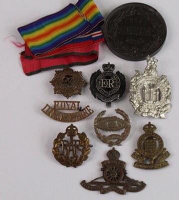 Lot 2225 - A collection of cap badges, shoulder titles...