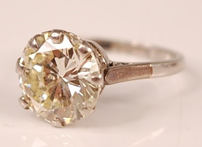 Lot 3100 - A platinum diamond solitaire ring, featuring a...