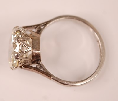 Lot 3100 - A platinum diamond solitaire ring, featuring a...