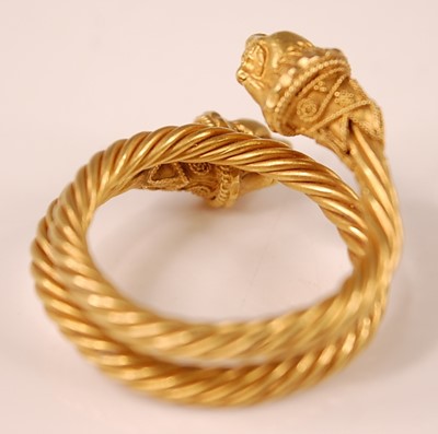 Lot 3114 - A yellow metal Etruscan style twisted...