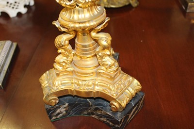 Lot 3206 - A gilt bronze pedestal oil lamp, having a...