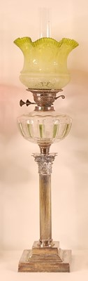 Lot 3210 - A silver plated pedestal oil lamp, having a...