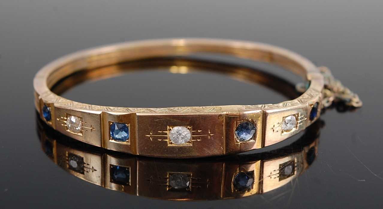 Lot 3082 - A late Victorian yellow metal, sapphire and...