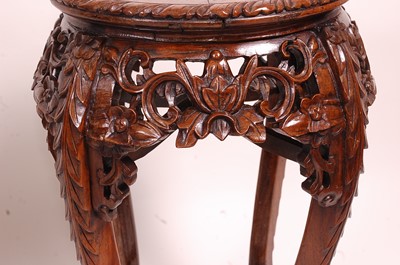 Lot 3240 - A circa 1900 Chinese 'rosewood' and variegated...