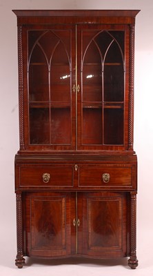 Lot 3373 - A Regency mahogany secretaire bookcase, having...