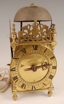 Lot 3322 - A Victorian brass lantern clock, having a fret-...