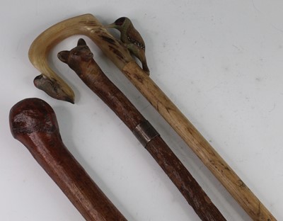 Lot 2526 - A mid-20th century walking staff, the tip...