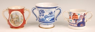Lot 3024 - A Victorian prattware loving cup, the reserves...