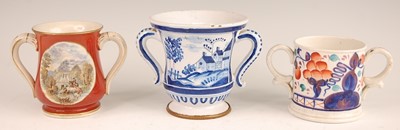 Lot 3024 - A Victorian prattware loving cup, the reserves...