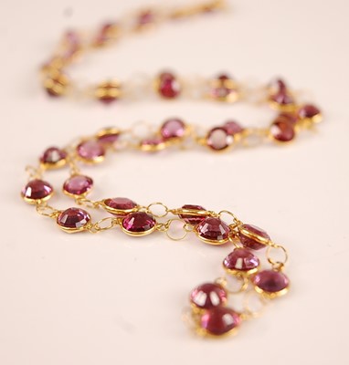 Lot 3132 - A contemporary yellow metal and rose garnet...