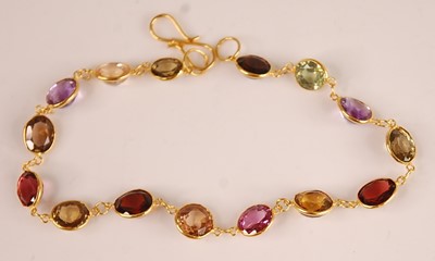 Lot 3117 - A contemporary yellow metal multi-stone...