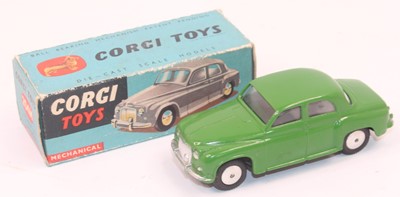 Lot 1021 - A Corgi Toys No. 204m Rover 90 saloon in green...