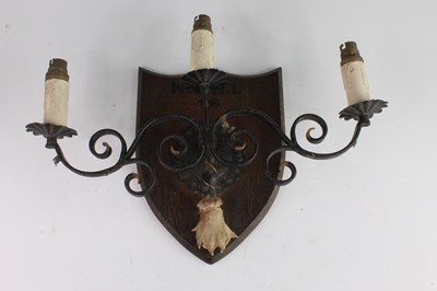 Lot 2712 - A mid-20th century wrought iron three sconce...