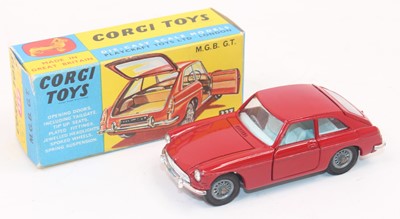 Lot 1044 - Corgi Toys No. 327 M.G.B GT in red with wire...