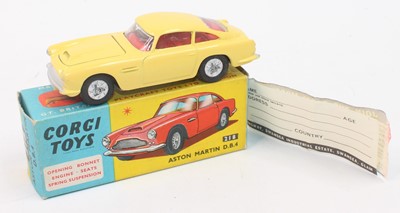 Lot 1064 - Corgi Toys No 218 Aston Martin in yellow and...