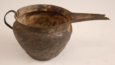 Lot 247 - * A wrought copper alloy pouring vessel,...