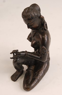 Lot 241 - * A cast bronze figure of the Bodhisattva Tara,...