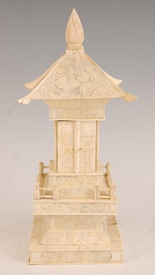 Lot 246 - * A sectional carved bone Buddhist shrine in...
