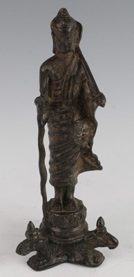 Lot 250 - * A Chinese cast bronze figure of the Buddha...