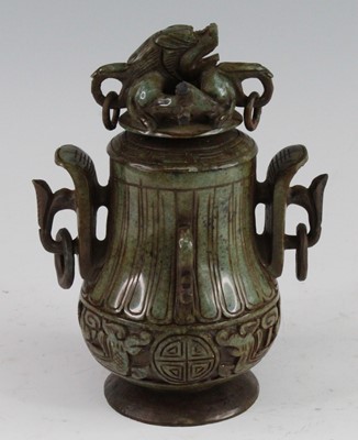 Lot 258 - * A Chinese carved jadeite covered jar and...